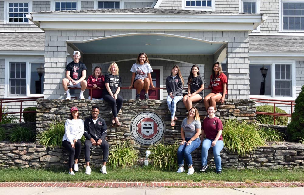 students in front of manor