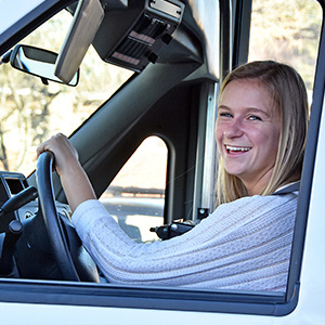 woman driving vehicle